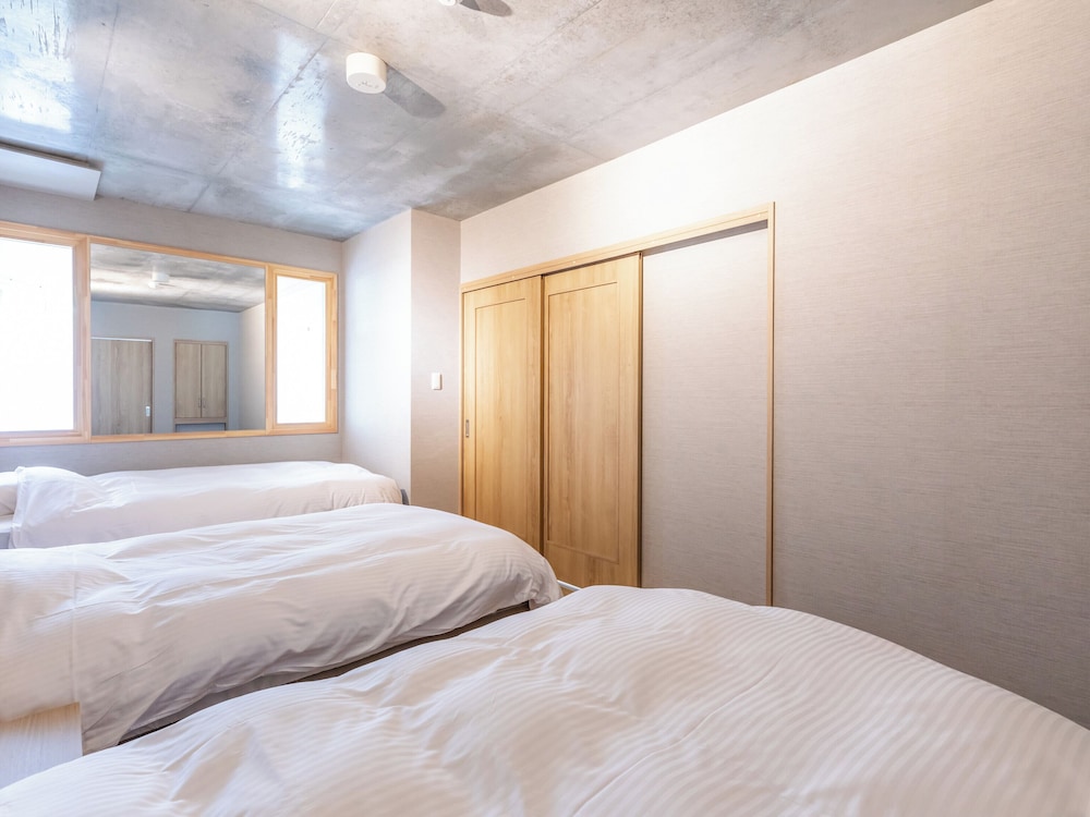 リビングスイート (セミダブル3台) 禁煙 客室2 | Tabist海宝樓 小樽