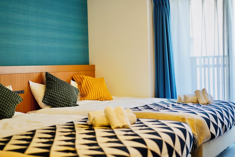 スイート ベッド (複数台) 禁煙 客室1 | 住一難波南新今宮店