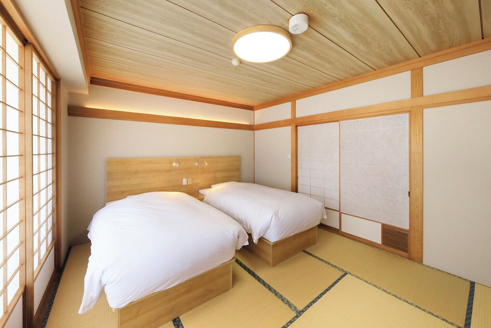 本館402〜404オーシャンビュー和洋室　ツインベッド 禁煙 客室6 | 博海温泉ホテル