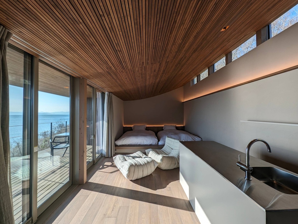 デラックス ツインルーム ダブルベッド 2 台 禁煙 シービュー | 千年オリーブテラス for your wellness