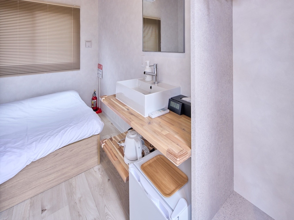 スタンダード ダブルルーム 禁煙 テラス バスルームのシンク0 | ヤンバルエクスペリエンス ホテル ヌンガニク