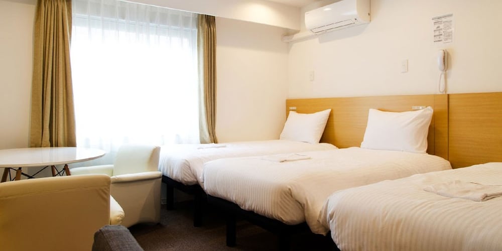 トリプルルーム シングルベッド 3 台 禁煙 客室1 | レンブラントイン青森