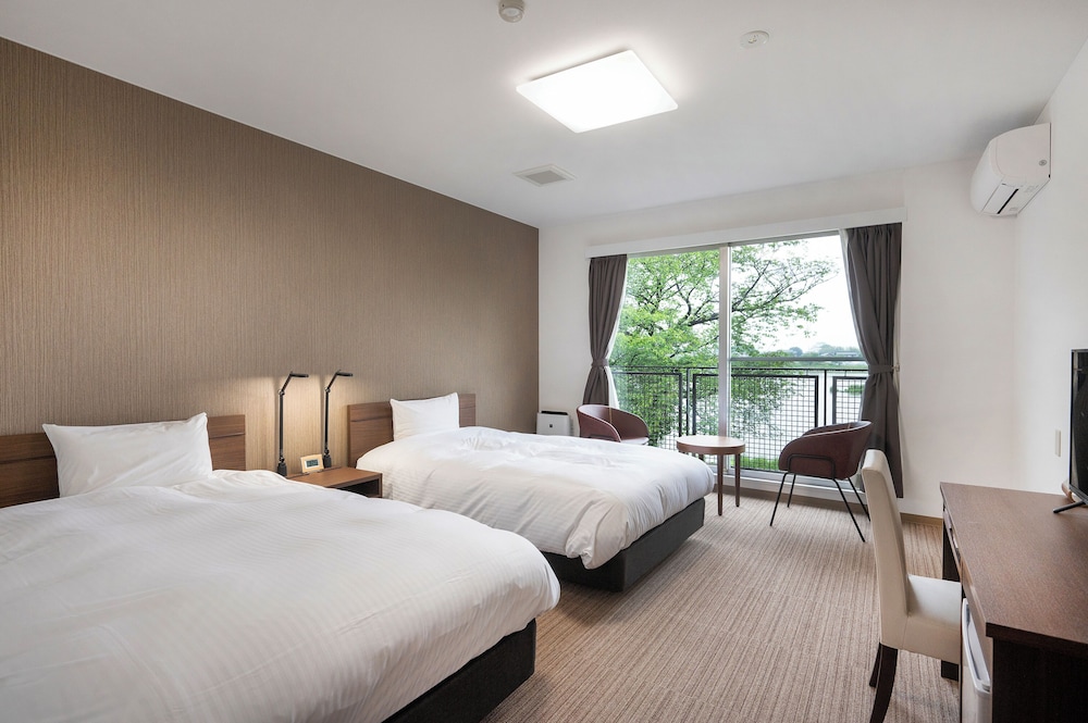 客室1 | 里沼リゾート Hotel KOMORINU