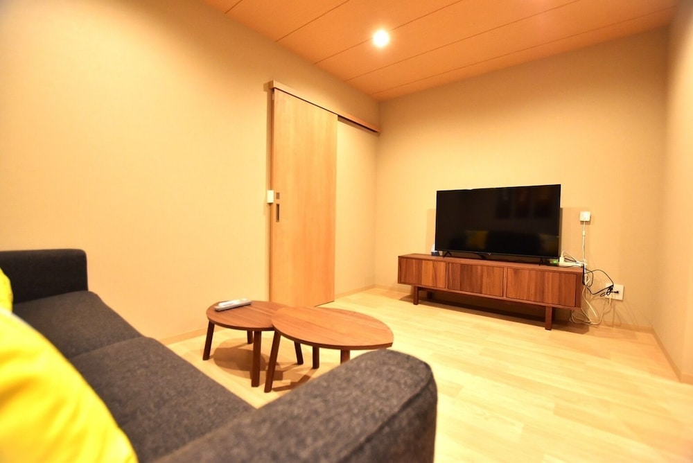 デラックス ハウス 2 ベッドルーム 禁煙 簡易キッチン リビング エリア7 | Tamatsukan