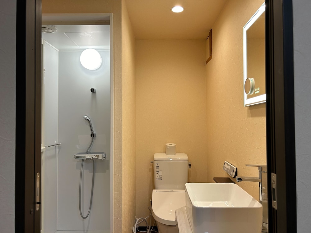 スタンダード ツインルーム 禁煙 専用バスルーム バスルーム0 | Jinya Sunset Inn by Murasaki