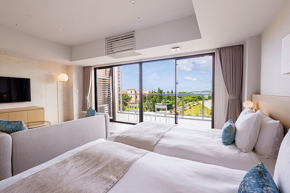 デラックスラージツイン(2-4階)<リゾートビュー> 客室1 | ホテル シギラミラージュ ビーチフロント