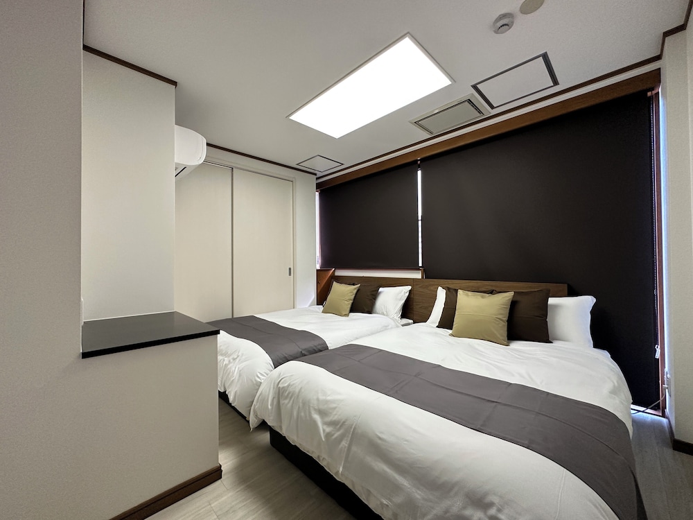 デラックス アパートメント 客室1 | LUXES 比治山 601