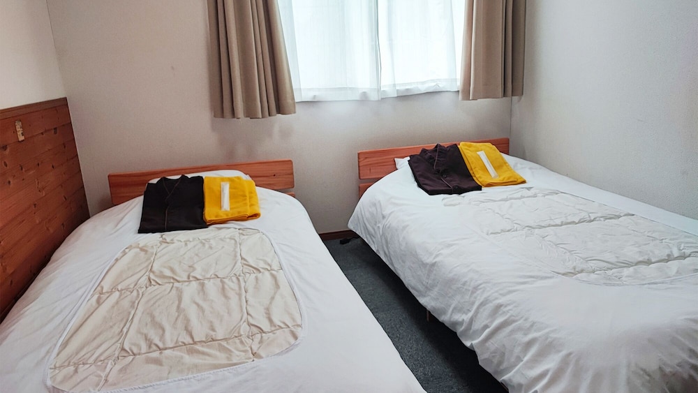 ベーシック ツインルーム シングルベッド 2 台 禁煙 | ホテル フロンティア