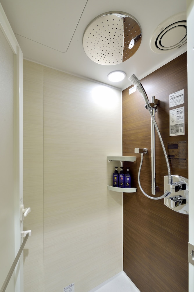 天然温泉（サウナ）特典付き！パーシャルハリウッドツインルーム 3名利用 【メインタワー】 バスルーム0 | COMMUNITY&SPA 那覇セントラルホテル