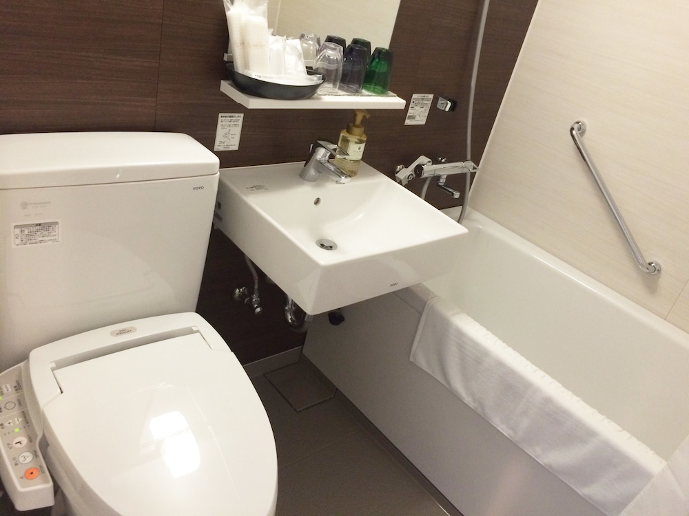 天然温泉(サウナ)特典付き!コンフォートツインルーム 【メインタワー】 バスルーム0 | COMMUNITY&SPA 那覇セントラルホテル