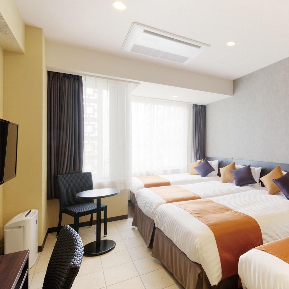 天然温泉（サウナ）特典付き！パーシャルハリウッドツインルーム 4名利用【メインタワー】 客室1 | COMMUNITY&SPA 那覇セントラルホテル