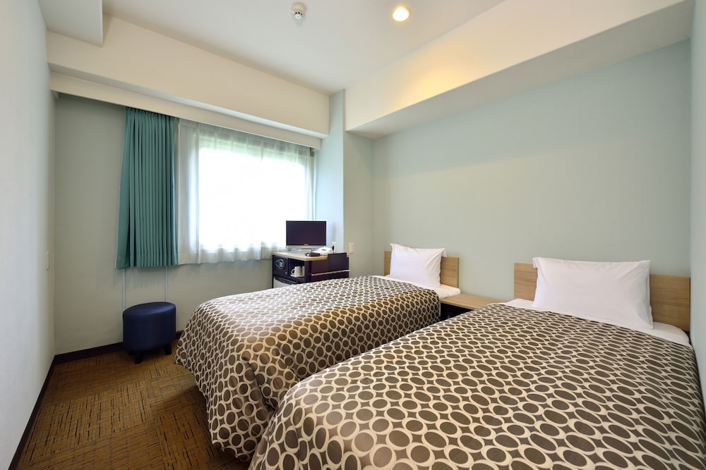 天然温泉（サウナ）特典付き！スタンダードツインルーム 【イーストタワー】 | COMMUNITY&SPA 那覇セントラルホテル