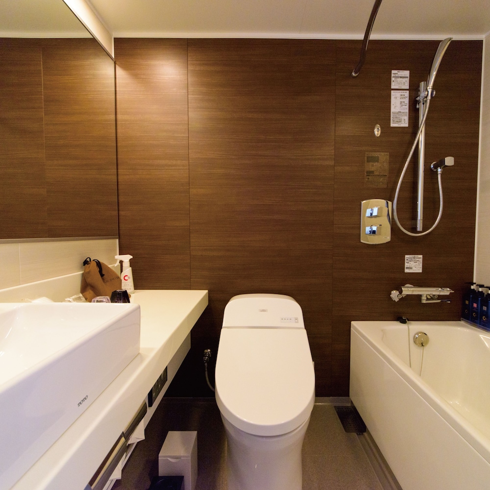 天然温泉（サウナ）特典付き！パティオツインルーム【メインタワー】 バスルーム0 | COMMUNITY&SPA 那覇セントラルホテル