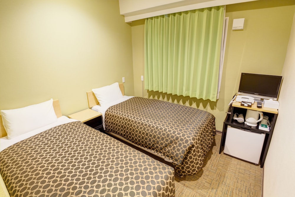 天然温泉（サウナ）特典付き！スタンダードツインルーム 【イーストタワー】 客室1 | COMMUNITY&SPA 那覇セントラルホテル