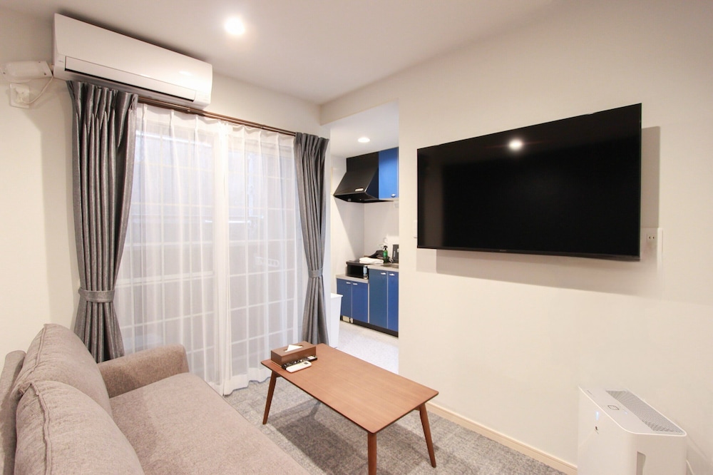 コンフォート アパートメント リビング エリア0 | ホテル サリフォート博多