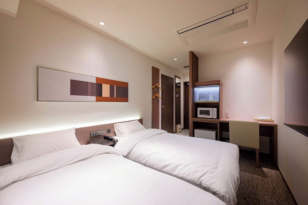 スタンダード ツインルーム シングルベッド 2 台 シティビュー | COCOYO HOTEL 大塚