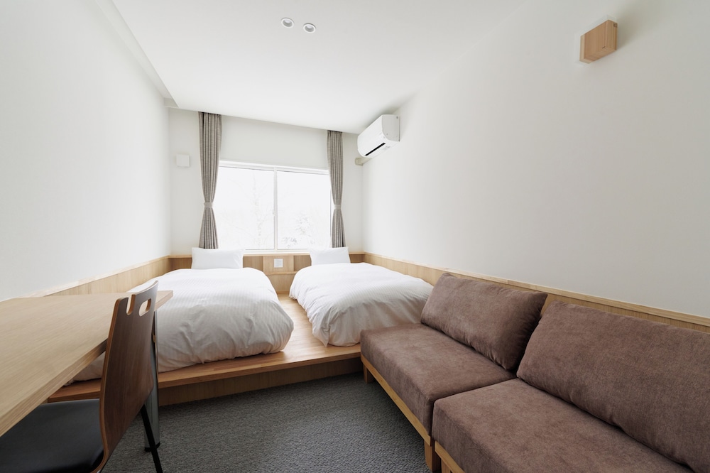 ベーシック ツインルーム ガーデンビュー 別館 客室2 | 石の湯ロッジ