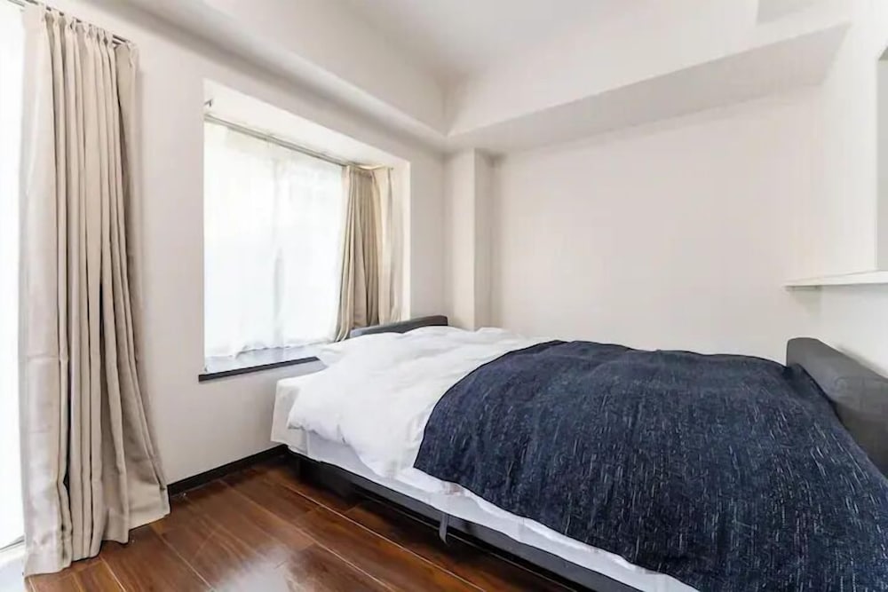 アパートメント シティビュー リビング エリア2 | ヴィラ三田村 303