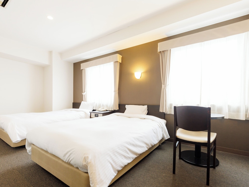 [禁煙] デラックスツインルーム 客室1 | TABIST ASAHIKAWA STATION HOTEL