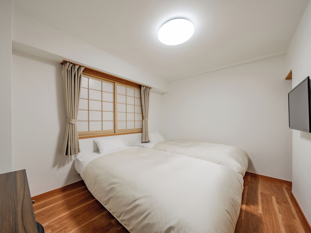 スタンダード ツインルーム シングルベッド 2 台 禁煙 客室1 | ホテル帯広ヒルズ