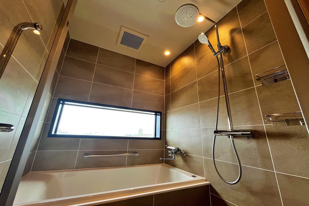 ジュニアスイート [スカイフロア(16F)] 禁煙 バスルーム1 | ラジェントホテル沖縄那覇