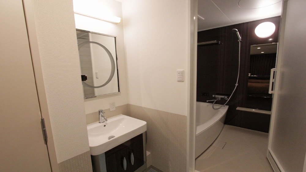 [電子タバコ可]リニューアル デラックスツインルーム バスルーム0 | ホテルニューガイア ドーム前