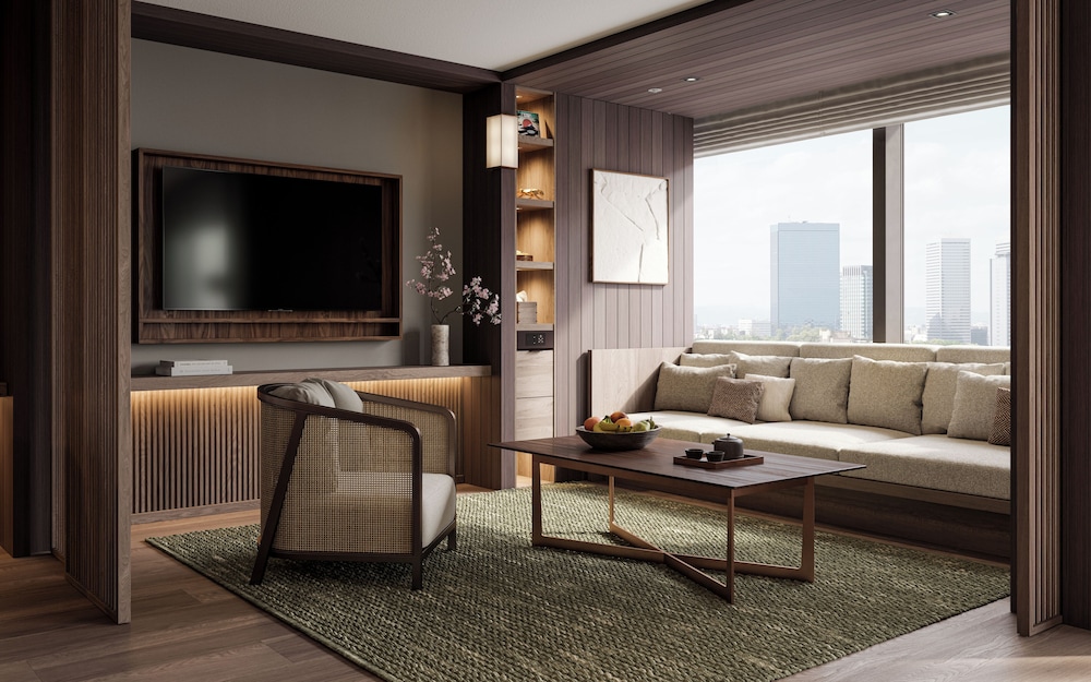 デラックス スイート キングベッド 1 台 シティビュー リビング エリア0 | パティーナ大阪