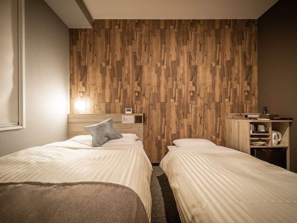 ソファ付きダブルベッドルーム（ツイン） | スーパーホテルPremierなんば心斎橋天然温泉