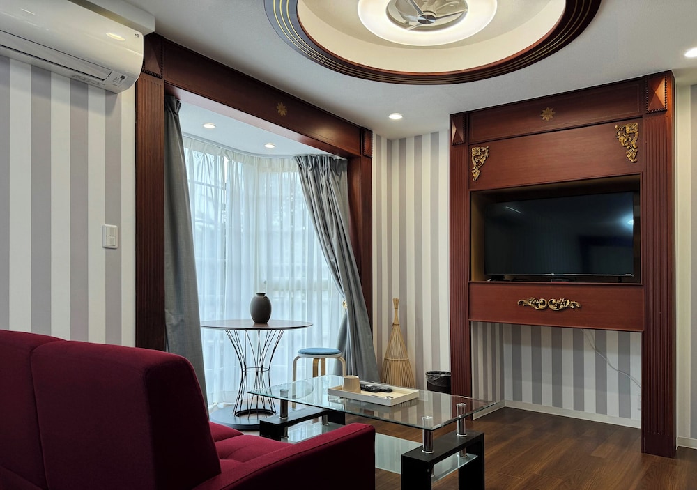 コンフォート ツインルーム コートヤードビュー リビング エリア0 | Rong Hua Grand Hotel