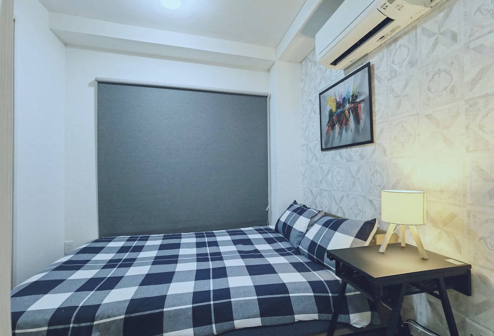 ファミリー アパートメント ダブルベッド 2 台 客室1 | WZNET梅屋敷