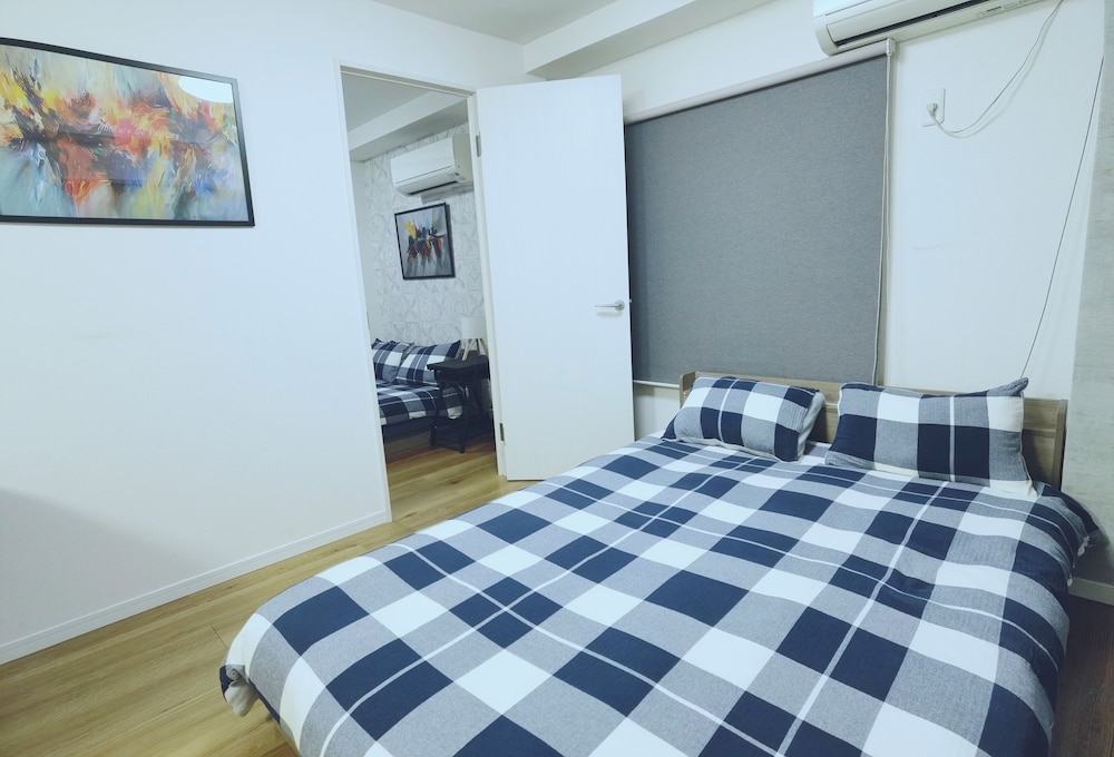 ファミリー アパートメント ダブルベッド 2 台 客室5 | WZNET梅屋敷