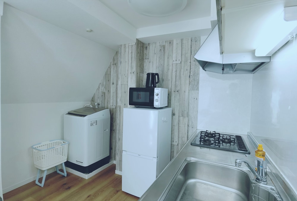 ファミリー アパートメント ダブルベッド 2 台 専用キッチン0 | WZNET梅屋敷