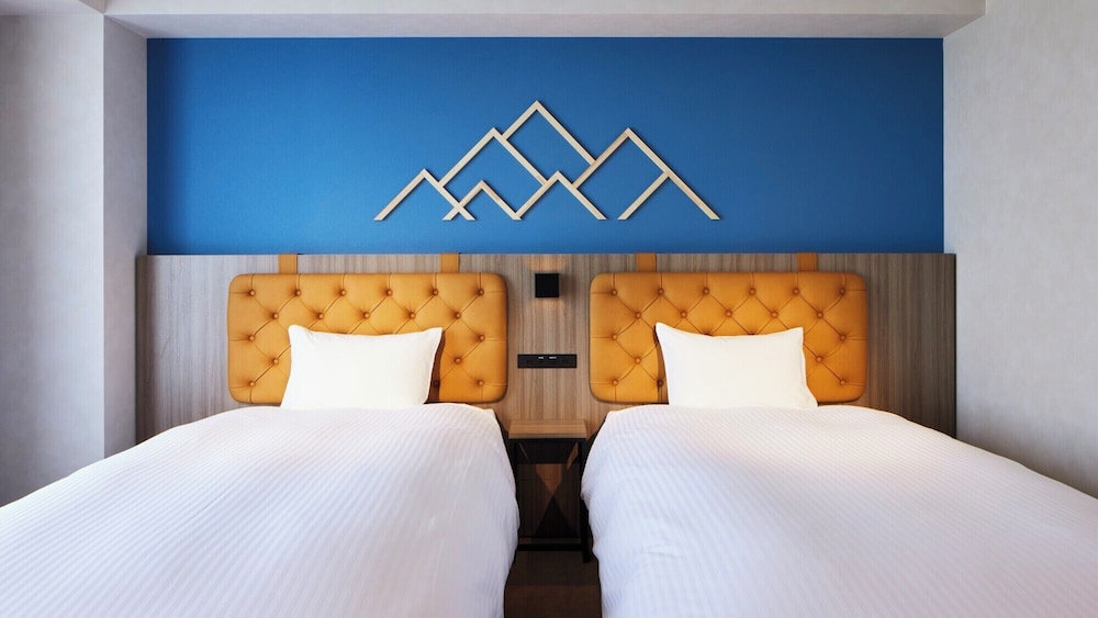 スターライトフロア スイート エスコンフィールドビュー 客室2 | エスコンフィールドHOKKAIDOホテル 北広島駅前