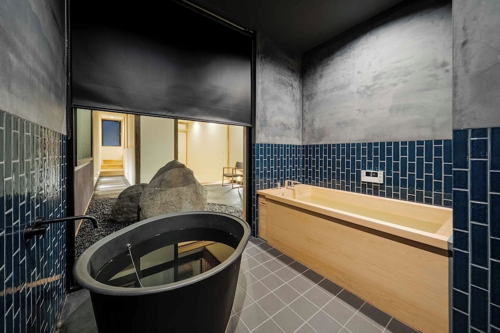 トラディショナル ハウス 2 ベッドルーム 禁煙 サウナ 深めの浴槽1 | 花里町町家ハウス