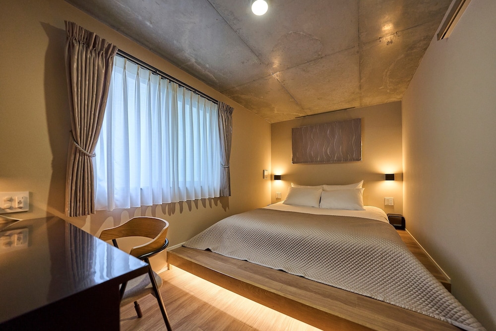 ファミリー コンドミニアム バルコニー ガーデンビュー 客室1 | R.KAMAKURA