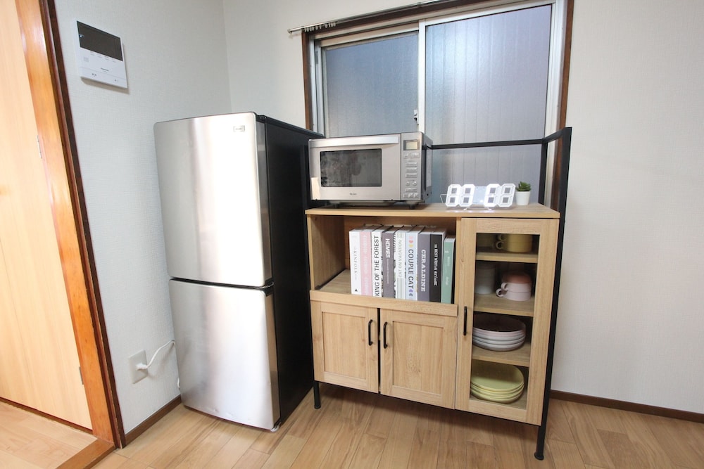 ファミリー ルーム 3 ベッドルーム 禁煙 (303) リビング エリア0 | LUANAホテル 新中野駅前