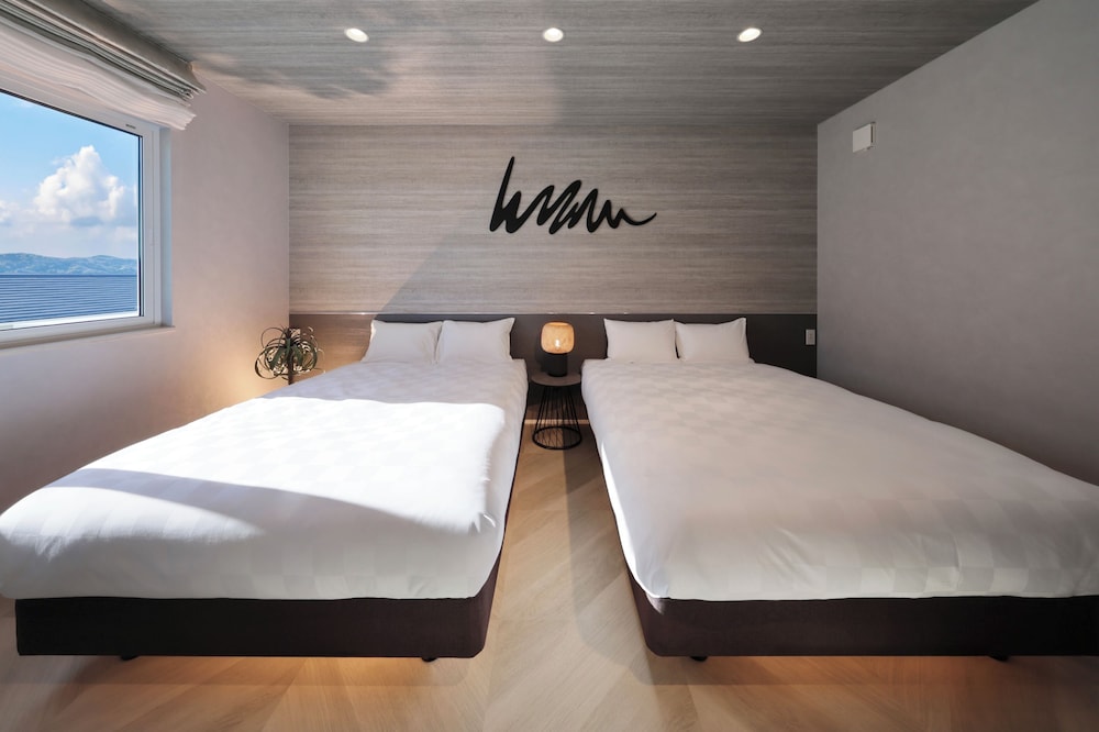 D棟_12名定員(プール&ジェットバス&天然温泉&サウナ) 客室1 | クリスタルヴィラ白浜パークサイド