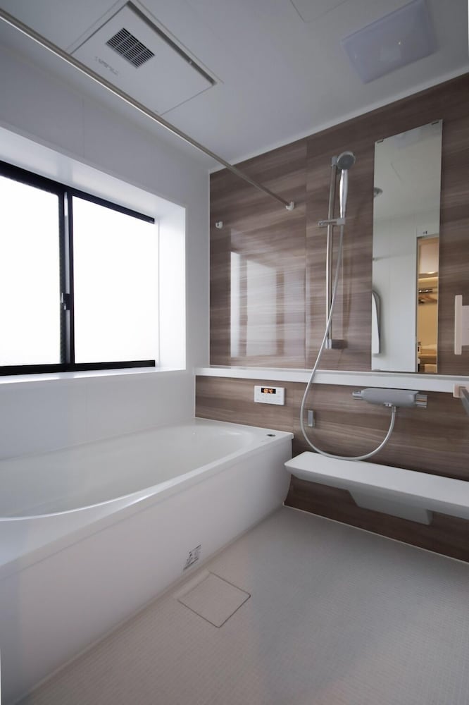 プレジデンシャル スイート ベッド (複数台) バルコニー シティビュー バスルーム0 | THE RESIDENCE HOTEL OKAYAMA