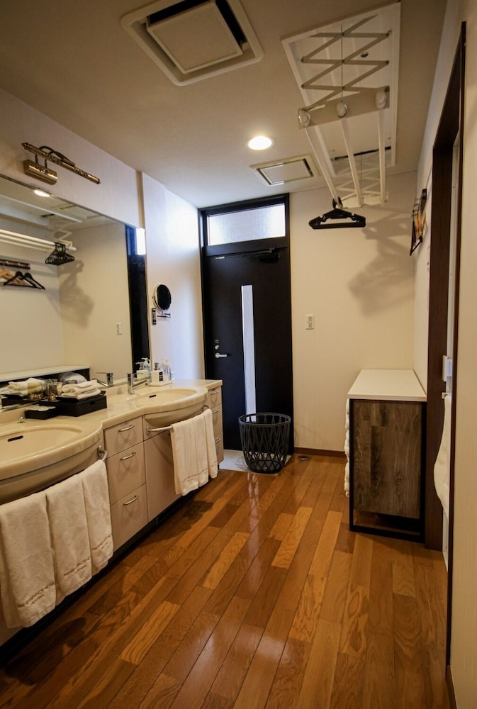 プレジデンシャル スイート ベッド (複数台) バルコニー シティビュー 客室15 | THE RESIDENCE HOTEL OKAYAMA