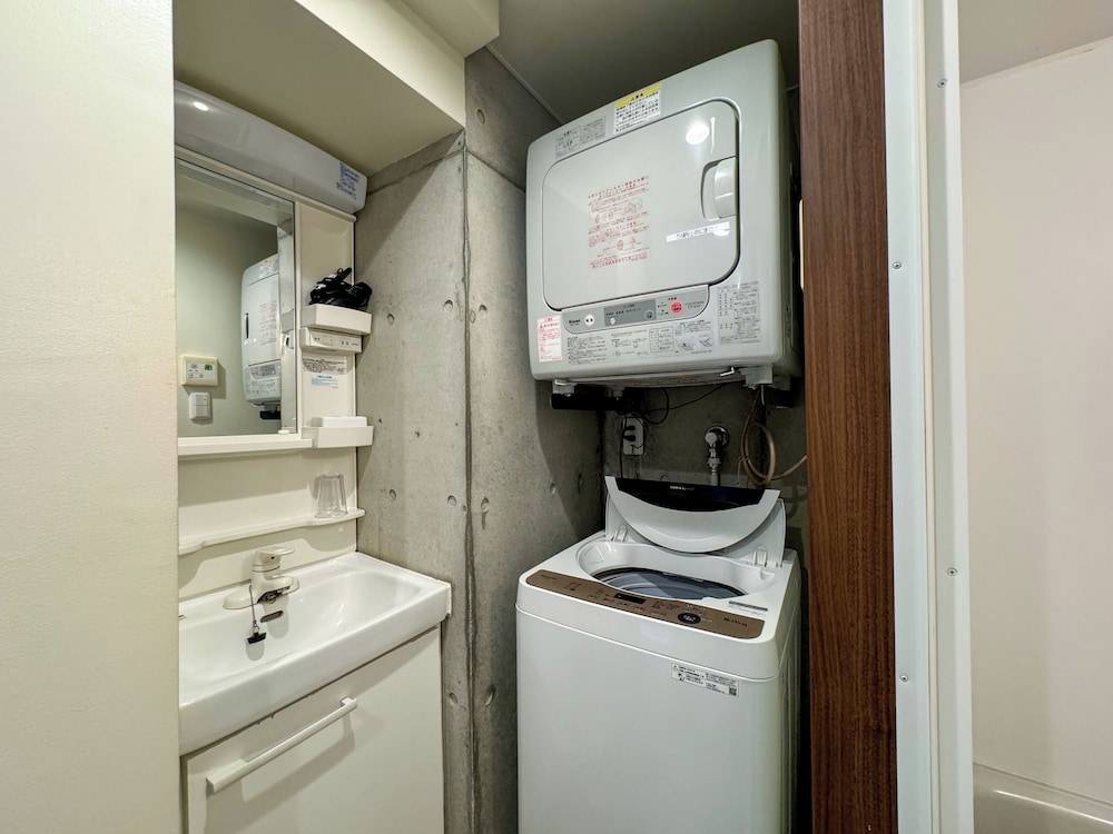 クラシック ツインルーム シングルベッド 2 台 禁煙 コーナー ランドリー1 | ランドーレジデンス那覇沖縄