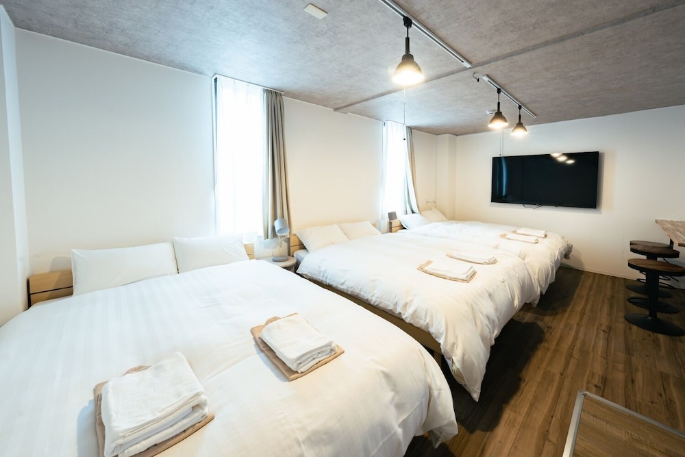 ファミリー ルーム 3 ベッドルーム 禁煙 客室1 | The book lounge hotel KANI