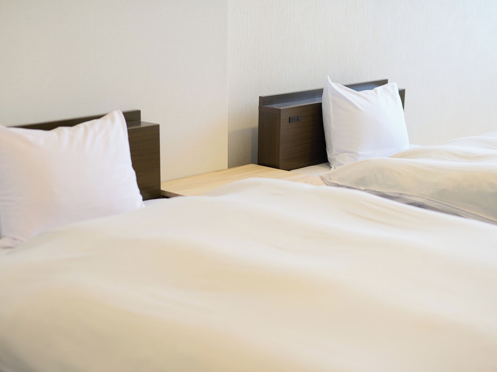 デラックスツインルーム + 6畳 禁煙 客室2 | おわらビューホテル