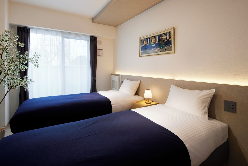 プレミアム アパートメント 客室2 | Minn 北広島 Station East