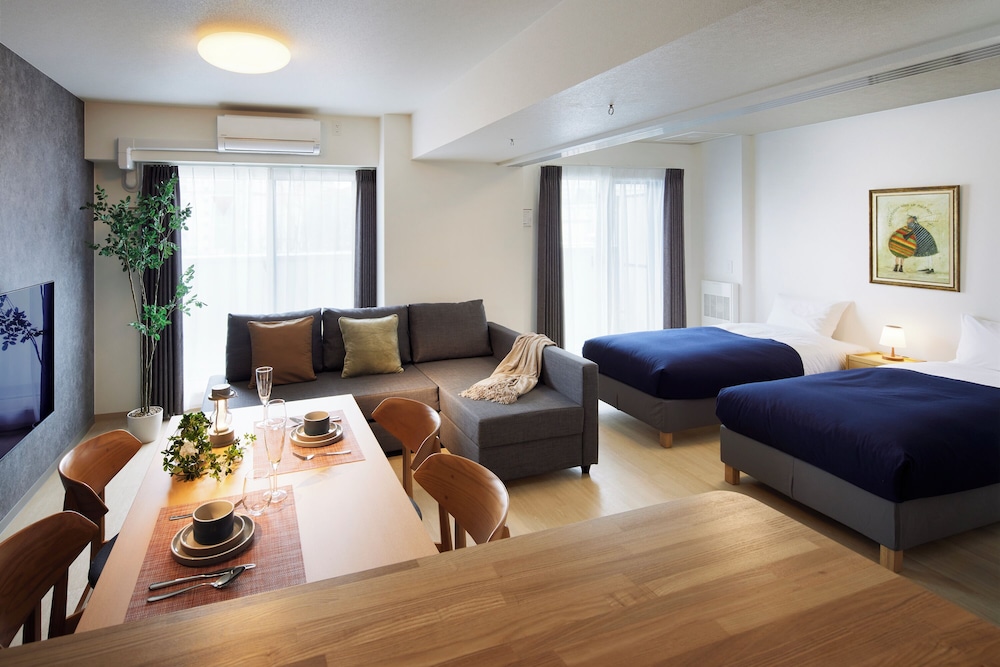 スーペリア アパートメント 客室1 | Minn 北広島 Station East