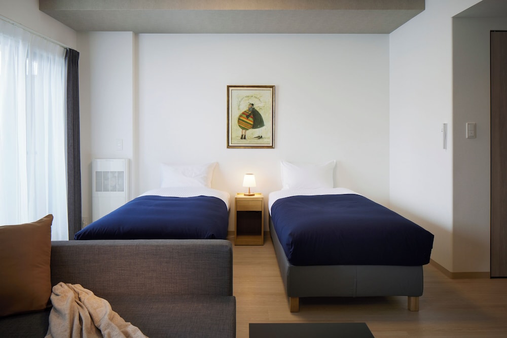 スーペリア アパートメント 客室2 | Minn 北広島 Station East