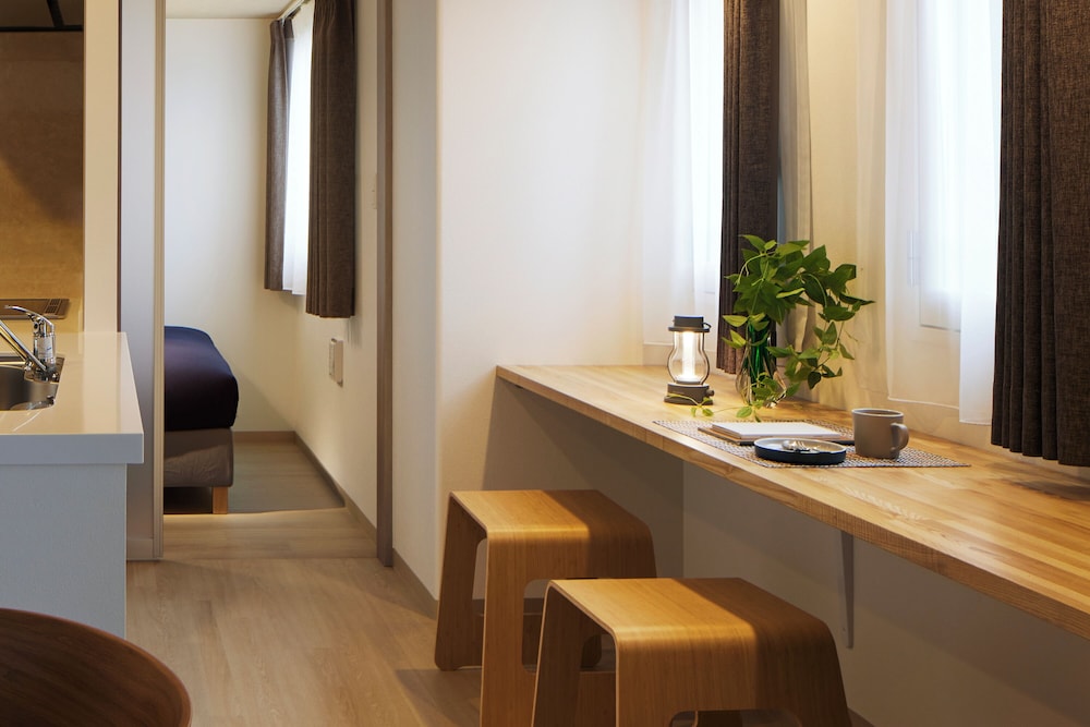 プレミアム アパートメント 客室1 | Minn 北広島 Station East