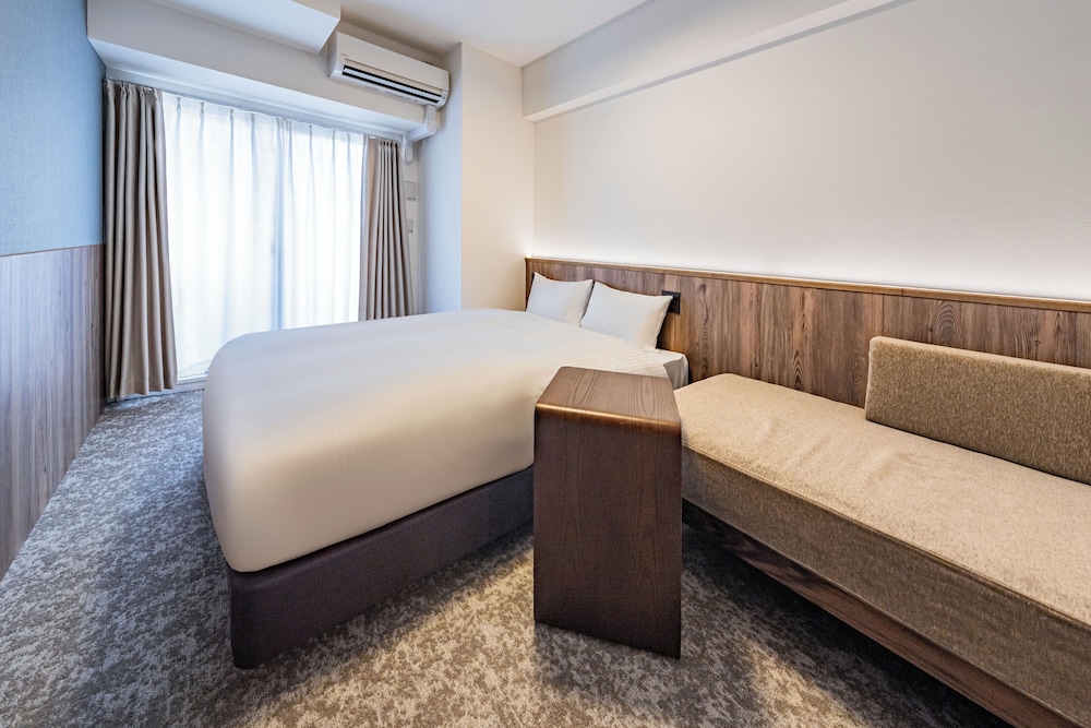 スーペリア ダブルルーム ダブルベッド 1 台ソファーベッド付き 禁煙 バルコニー 客室10 | Apartment Hotel 11 Osaka Dome
