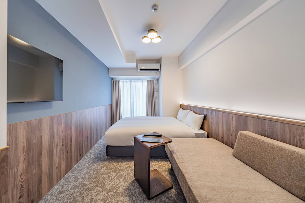 スーペリア ダブルルーム ダブルベッド 1 台ソファーベッド付き 禁煙 バルコニー 客室5 | Apartment Hotel 11 Osaka Dome