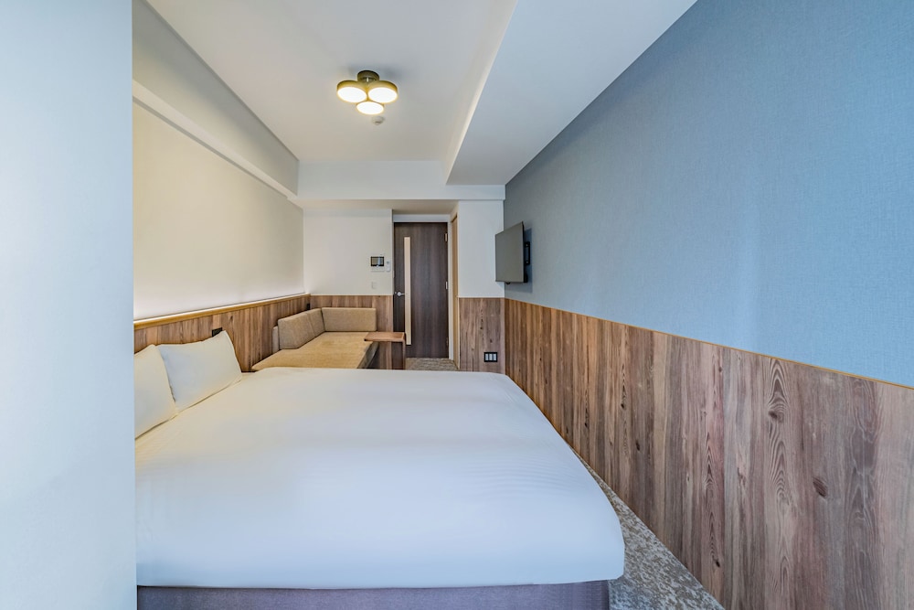 スーペリア ダブルルーム ダブルベッド 1 台ソファーベッド付き 禁煙 バルコニー 客室6 | Apartment Hotel 11 Osaka Dome