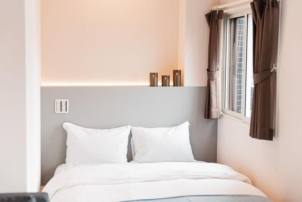 スタンダード アパートメント ベッド (複数台) シティビュー 客室1 | SAIEI HOTEL